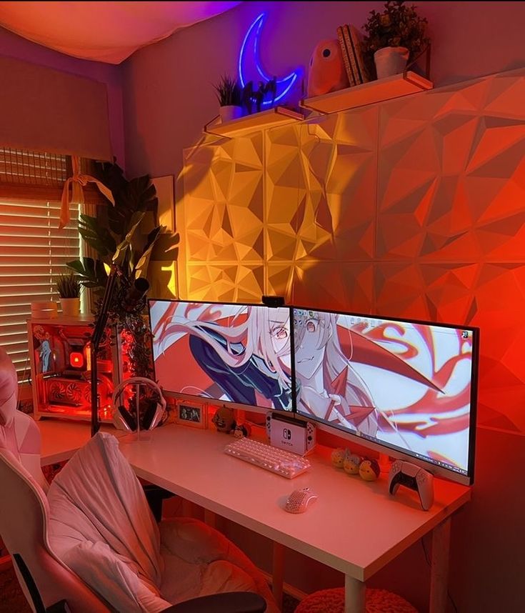 two computer monitors sitting on top of a desk in front of a neon colored wall