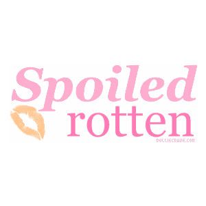 the word spoiled rotten written in pink on a white background