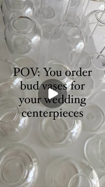 rows of wine glasses with the words pov you order bud vases for your wedding centerpieces