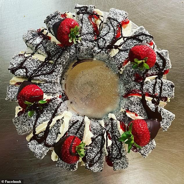 a cake with chocolate and strawberries on top