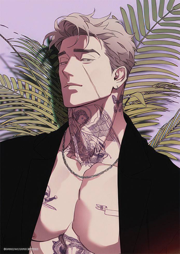 a man with tattoos on his chest standing in front of some plants and palm trees