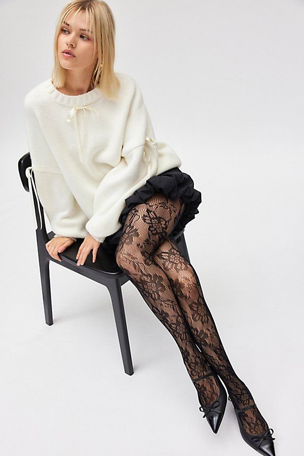 Sheer lace tights with an allover floral pattern for a femme finish. Features Ella lace tights Sheer tights Allover lace pattern Comfy waistband Content + Care 92% Nylon, 8% spandex Hand wash Imported Size + Fit S/M 4'10" -5'6" 90-130lbs L/XL 5'7" -5'6" 130-200lbs | Ella Lace Tights in Black, Women's at Urban Outfitters Nylons And Heels, Sheet Black Tights Outfit, Black Tights With Design, Black Lace Tights Outfit, Floral Tights Outfit, Granny Outfit, Lace Tights Outfit, Outfit With Tights, Black Lace Leggings