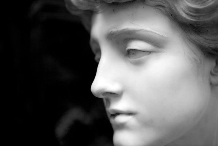 a black and white photo of a woman's head