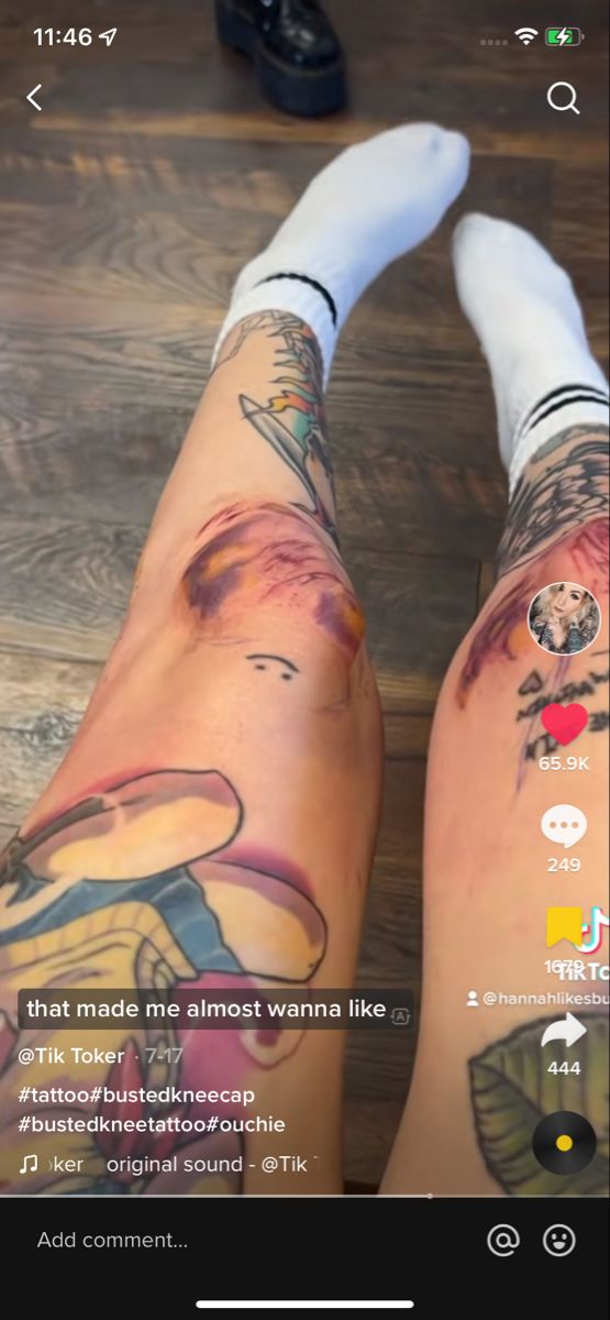 two people with tattoos on their legs and one is showing the same person's leg