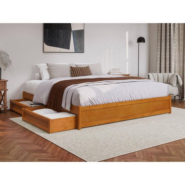 a bed sitting on top of a wooden platform