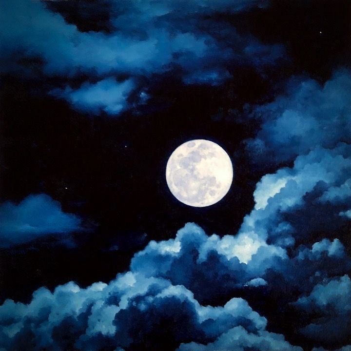 the full moon is shining brightly in the dark night sky with fluffy clouds and blue hues