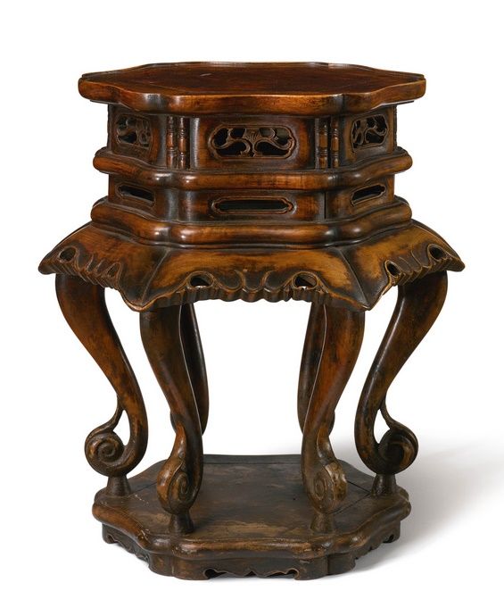 an ornate wooden table with two drawers on it's legs and one drawer at the top