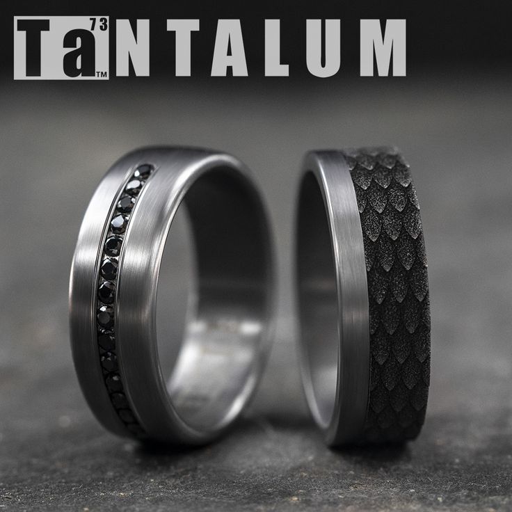 two wedding bands with black diamonds on them are shown in front of the words tantalum