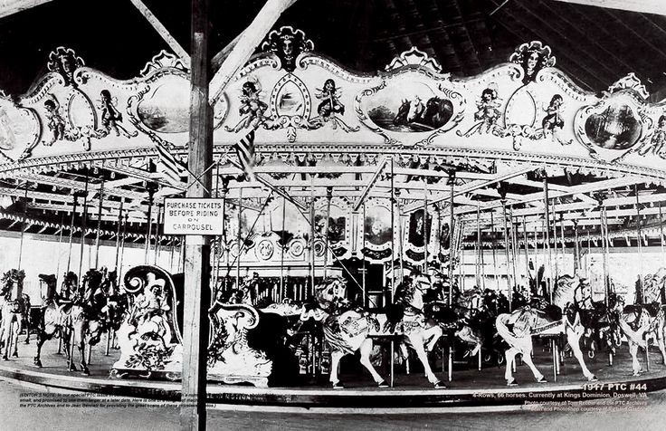 an old black and white photo of people on a merry go round