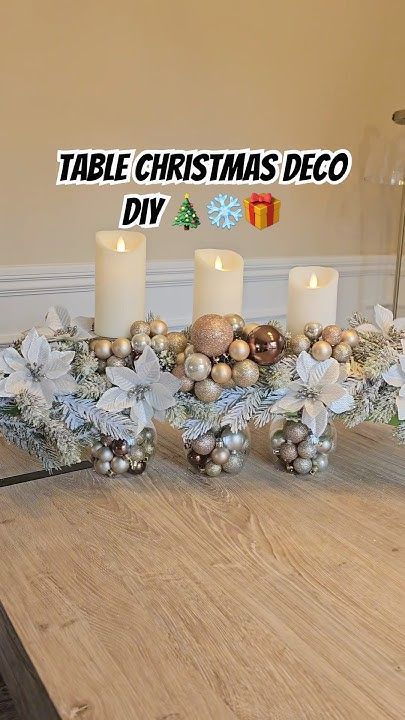 a table with candles and ornaments on it in front of a christmas sign that reads table christmas deco diy