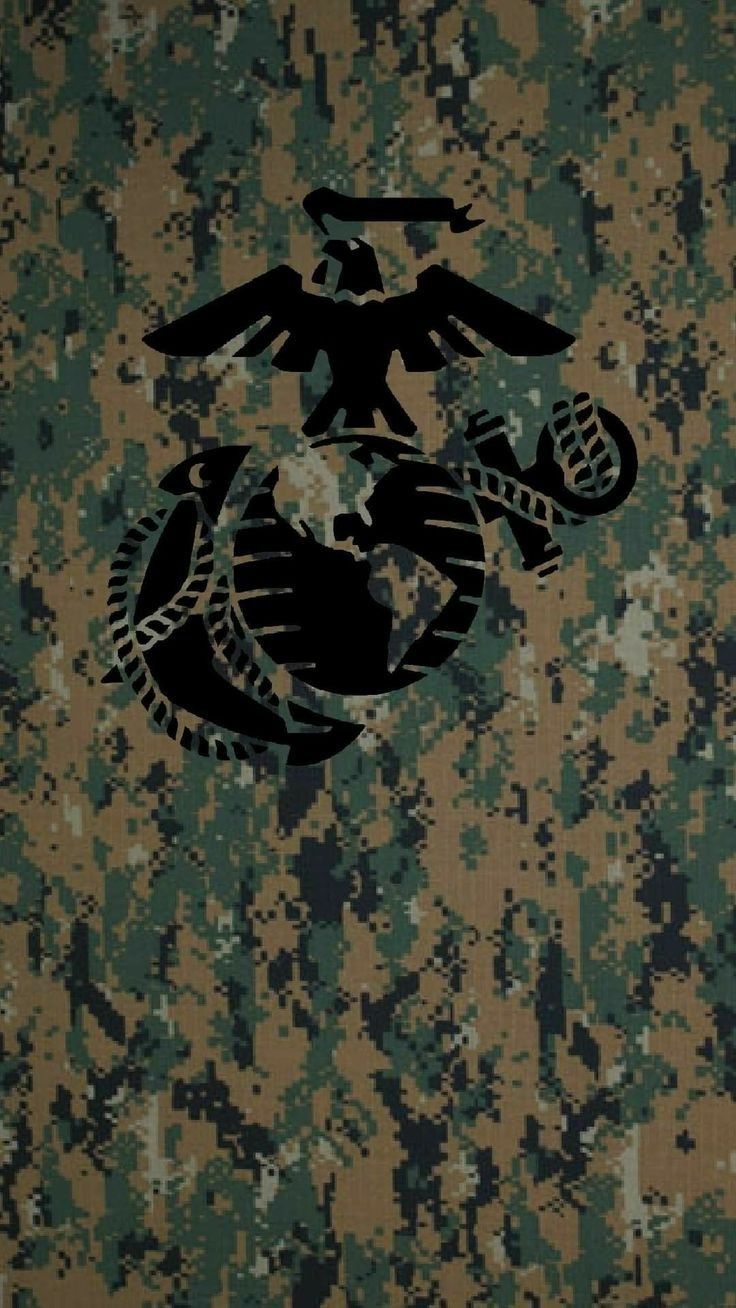 the us marine emblem is on a camouflage background