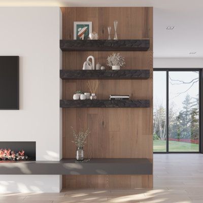 a modern living room with wood and white decor