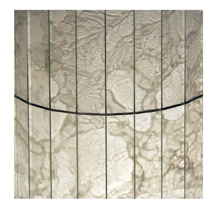 an image of a white marble wall with lines on it