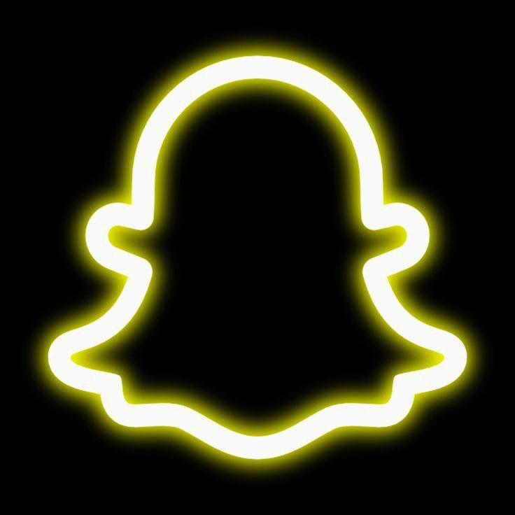 a glowing snap icon in the dark with yellow light coming from it's side