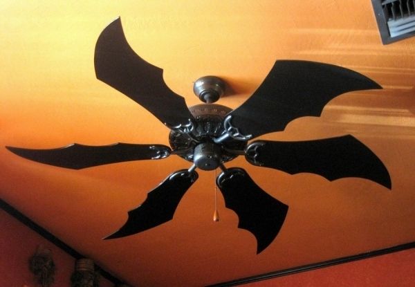 a ceiling fan with the words batman painted on it