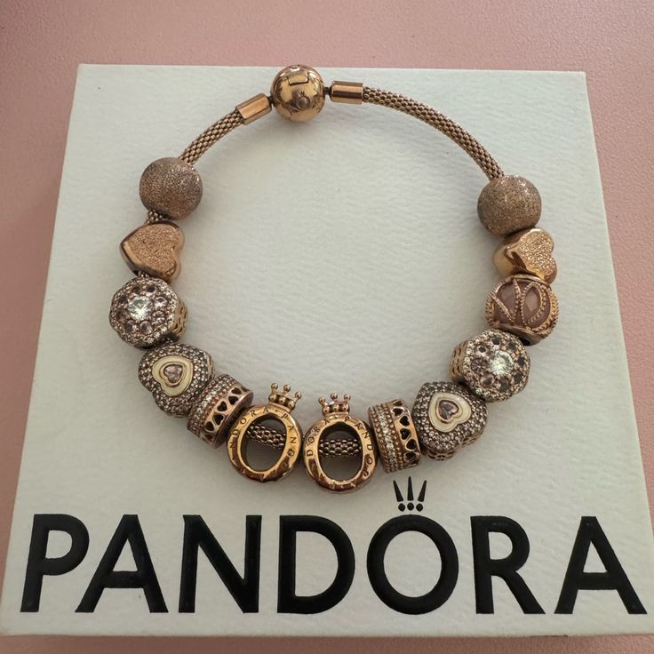 This Is An Authentic Rose Gold Pandora Bracelet With 11 Charms And 2 Clips. I Paid Over $1,500 For This At A Pandora Store. I Only Have Worn This A Couple Of Times. There Maybe Slight Discoloring. Please Look At My Other Jewelry, Because I Am Willing To Bundle Items For Better Prices. Please See All Pictures As They Are Part Of My Description. Please Message Me With Any Questions. No Returns Accepted Rose Gold Pandora Bracelet, Gold Pandora Bracelet, Pandora Rose Gold Bracelet, Rose Gold Pandora, Pandora Charms Rose Gold, Pandora Store, Gold Pandora, Girl Hood, Pandora Rose Gold