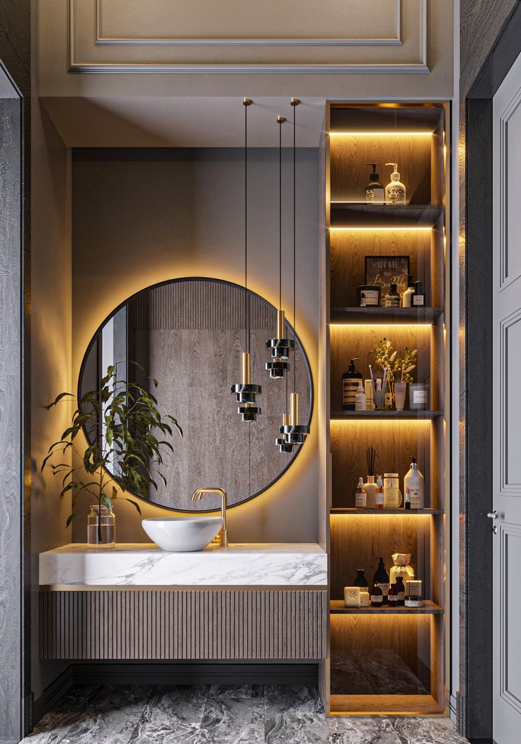 a bathroom with a round mirror above the sink