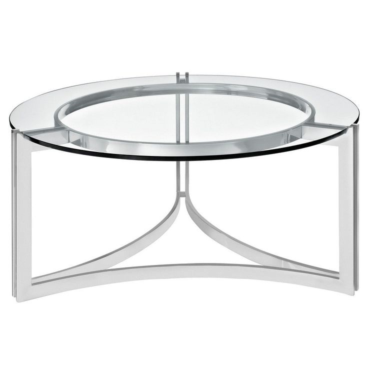 a round glass table with metal legs