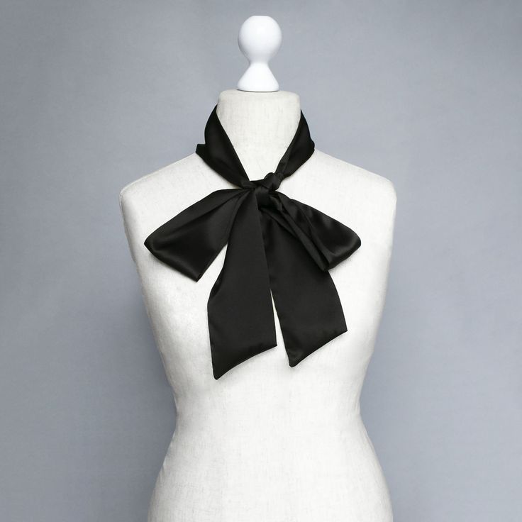 The black silk hand-made skinny scarf This black silk bow tiу adds a silky, sophisticated accent for year-round wear. The bow tie is a perfect way to accentuate simple clothes to look smart The necktie is produced from 100% silk. Sizes: Width: 8 cm / 3.14 inches Length: 177 cm / 70 inches Handmade item The product manufacturing takes 1-3 working days Please note that the color may slightly vary due to photographic lighting sources or your monitor settings. Check my other listings to see more siz Elegant Silk Scarf With Ribbon For Gift, Formal Solid Color Satin Scarves, Black Silk Scarves As A Gift, Elegant Silk Tie Neck Scarf With Ties, Elegant Silk Scarf With Ribbon, Elegant Satin Scarves As Gifts, Elegant Scarves With Ribbon For Gift, Elegant Tie Neck Silk Scarf, Chic Satin Silk Scarf For Party