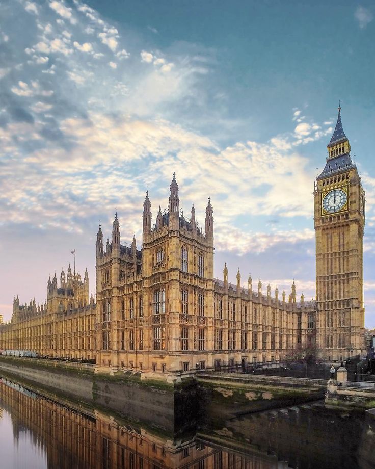 the big ben clock tower towering over the city of london