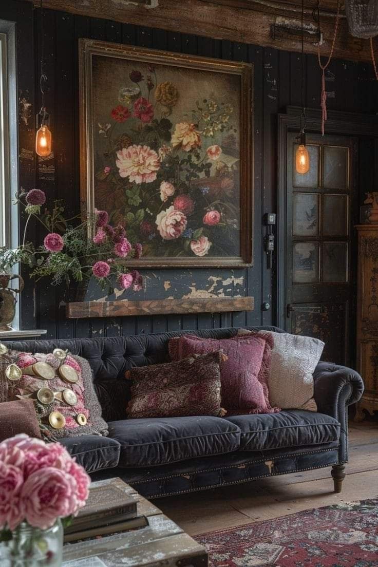 a living room filled with furniture and flowers