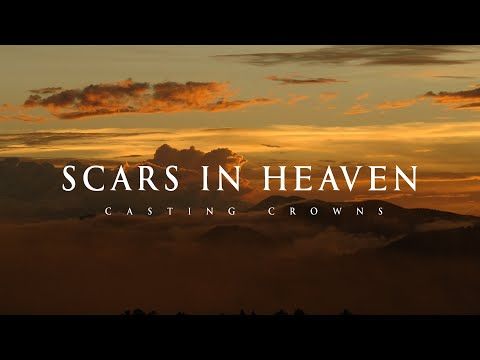 the title for scarsinheaven casting crowns, with clouds and mountains in the background