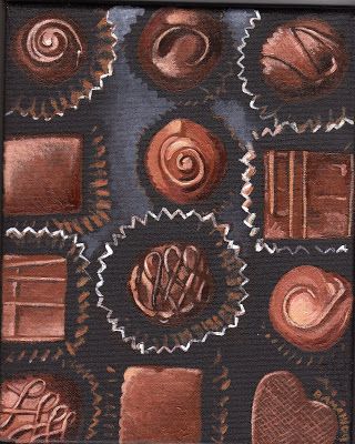 an image of chocolates on display in a box