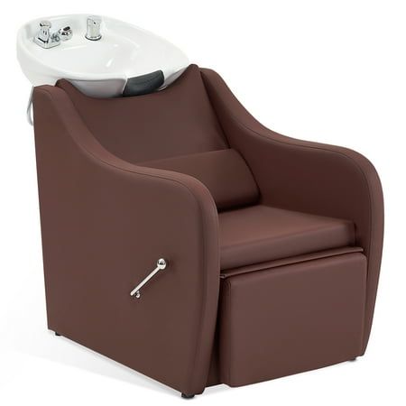 a brown chair with a white sink on it's back and armrests