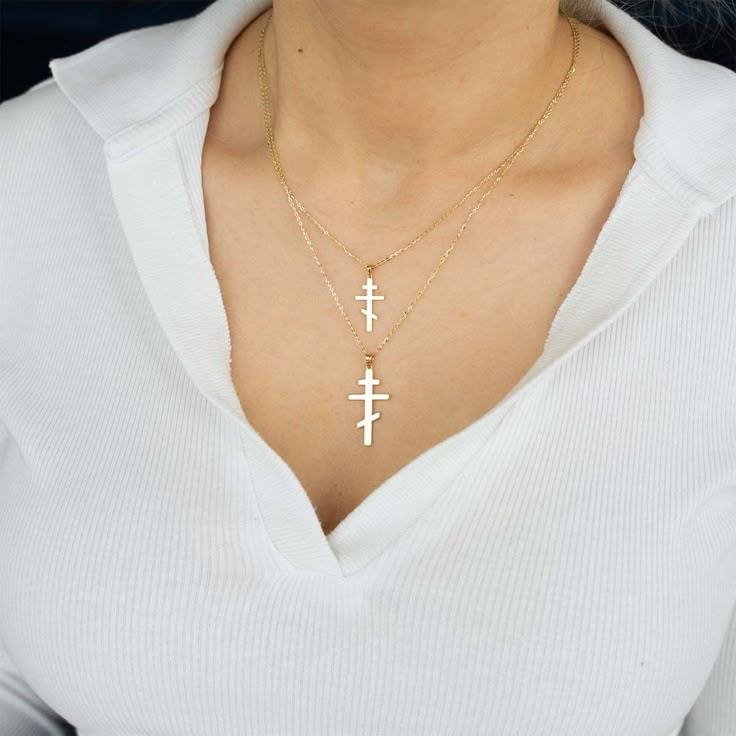 The modern Orthodox cross necklace is a simple piece that can be layered or worn on its own for a look that's clean yet elegant. This necklace features a three-barred Orthodox cross in a flat, unembellished design. Choose from a standard or mini pendant to customize this Orthodox cross necklace.  This product is for the standard sized version of the pendant. For the mini sized version, please visit: www.etsy.com/ca/listing/1331925151/mini-modern-orthodox-cross-necklace Mini Pendant Size: - Width Minimalist White Crucifix Jewelry, Orthodox Cross Necklace, Orthodox Cross, Mini Pendant, The Modern, Cross Necklace, White Gold, Pendant, Gold