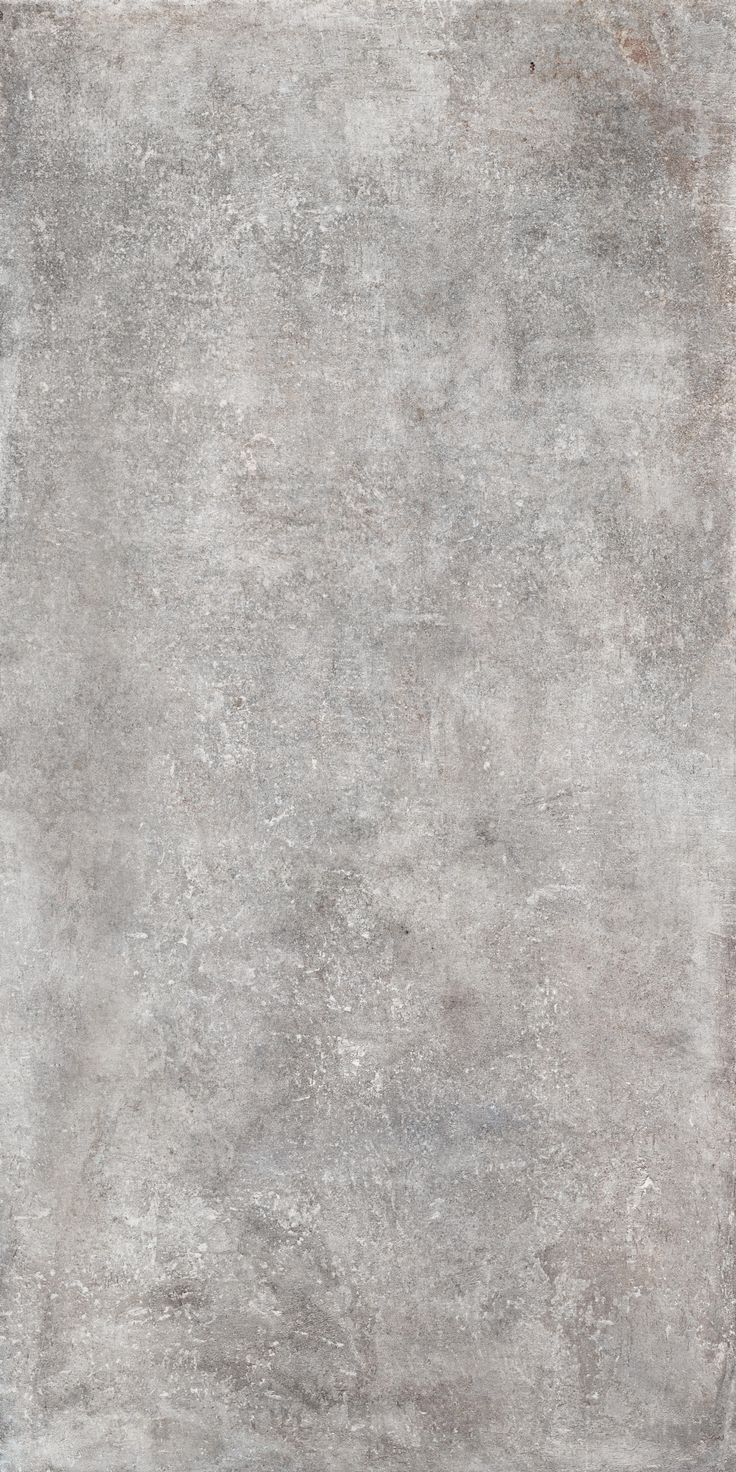 a gray area rug with an uneven design