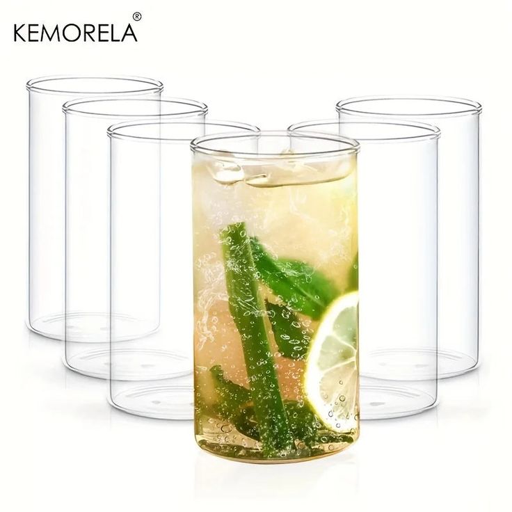 four glasses filled with lemonade, lime and mint tea on top of each other