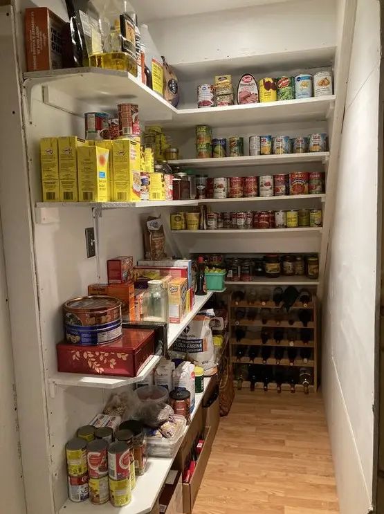 an empty pantry with lots of food on the shelves