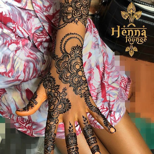 henna tattoo on the hands of a woman