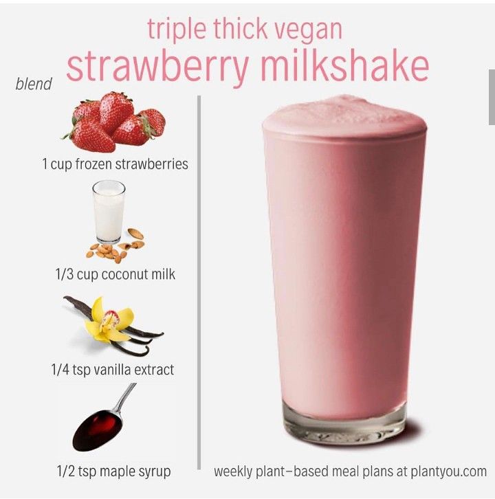 a pink smoothie in a tall glass with ingredients to make it look like strawberry milkshake