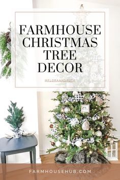 the farmhouse christmas tree is decorated with white and silver ornaments, pine cones and greenery