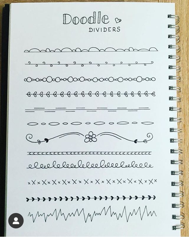 a notebook with doodle and dividers written on it