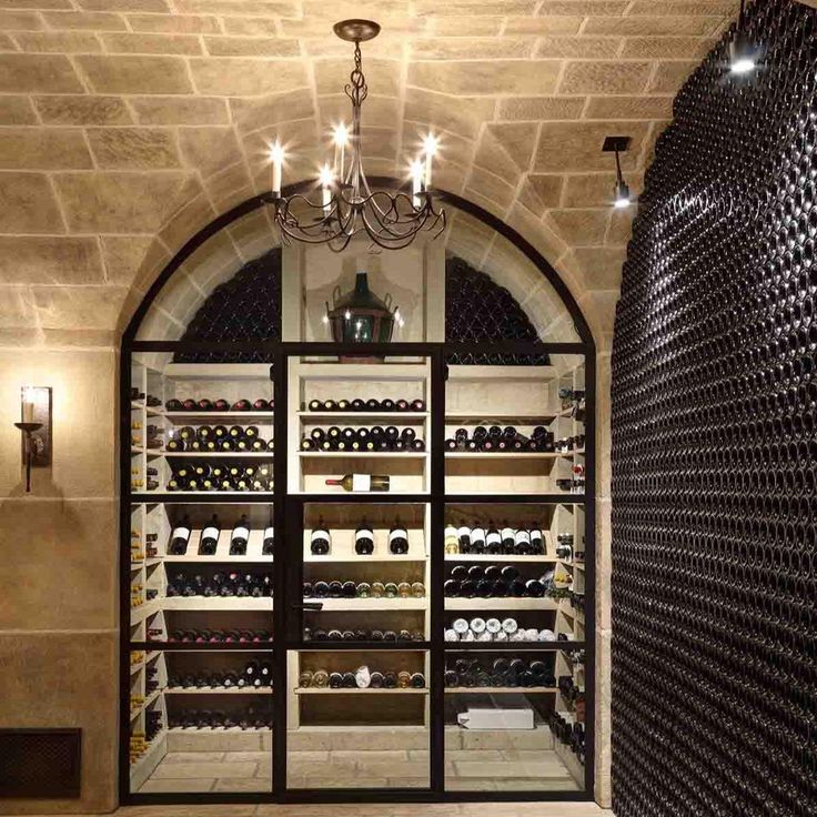 a wine cellar with lots of bottles in it