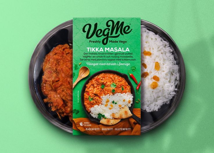 a plate with rice and meat next to a packet of veggie masala