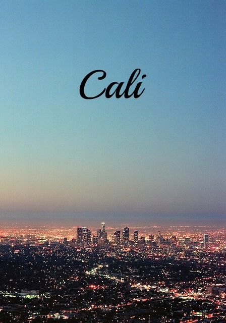 an aerial view of the city at night with text that reads cali above it