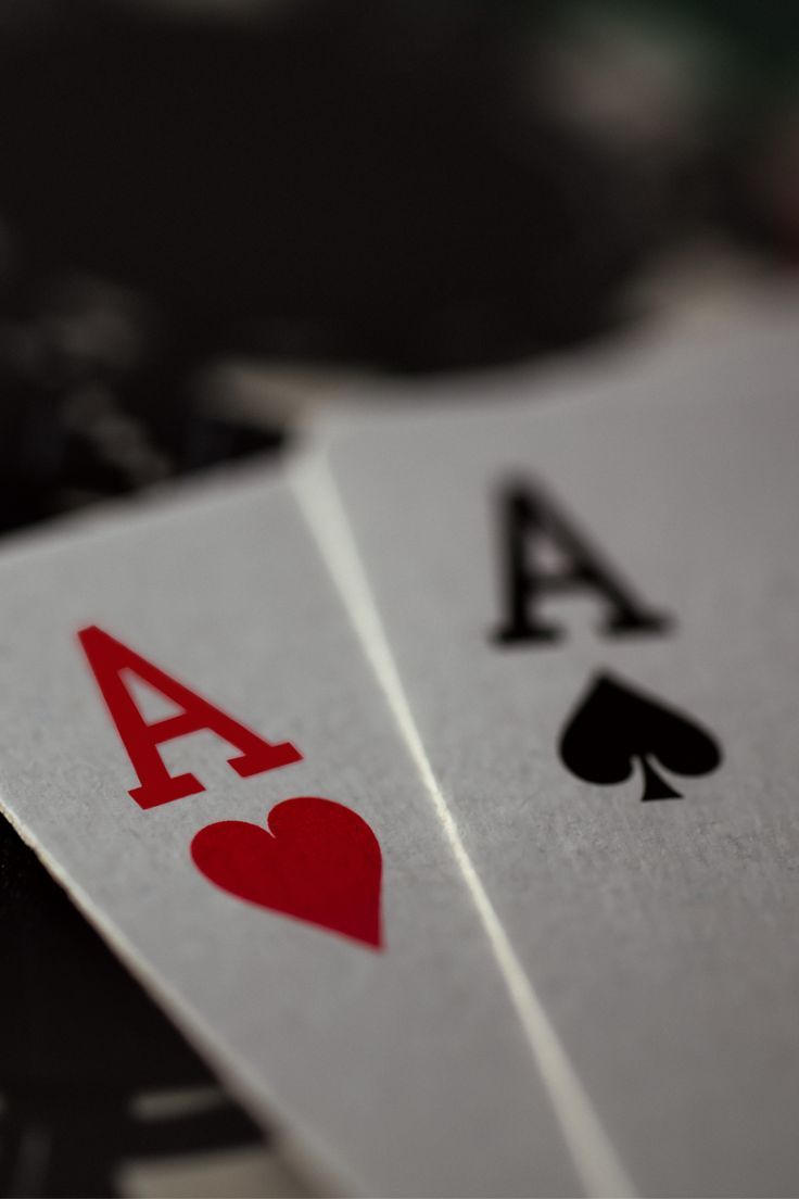 three playing cards with the letter a on them