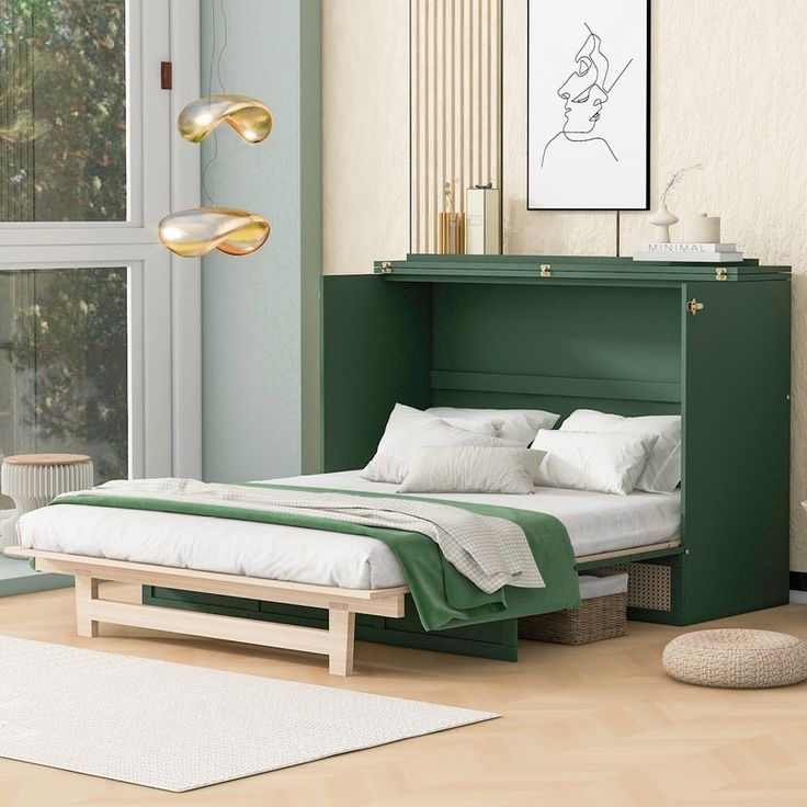 a bedroom with a bed and green cabinet in it