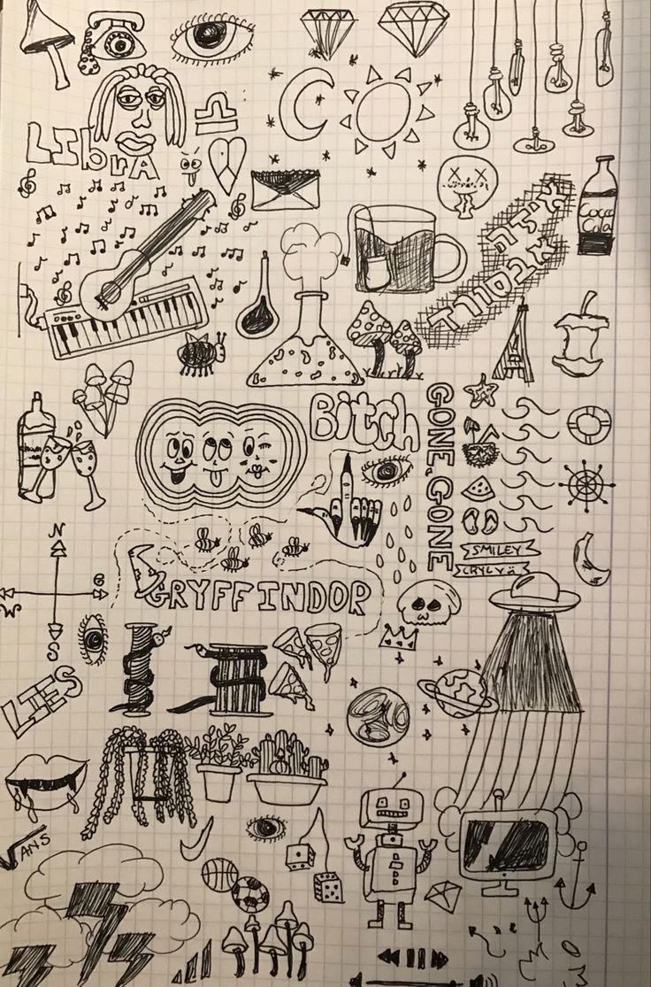 a notebook with doodles on it and various things in the page, including an image of