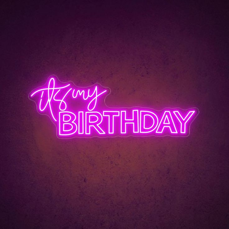 a neon sign that says happy birthday on it