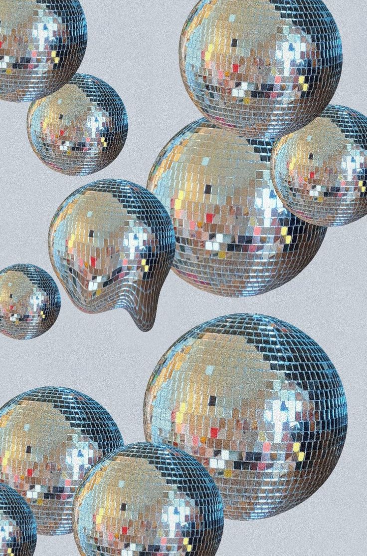 there are many shiny disco balls in the shape of an x - ray mirror on top of each other