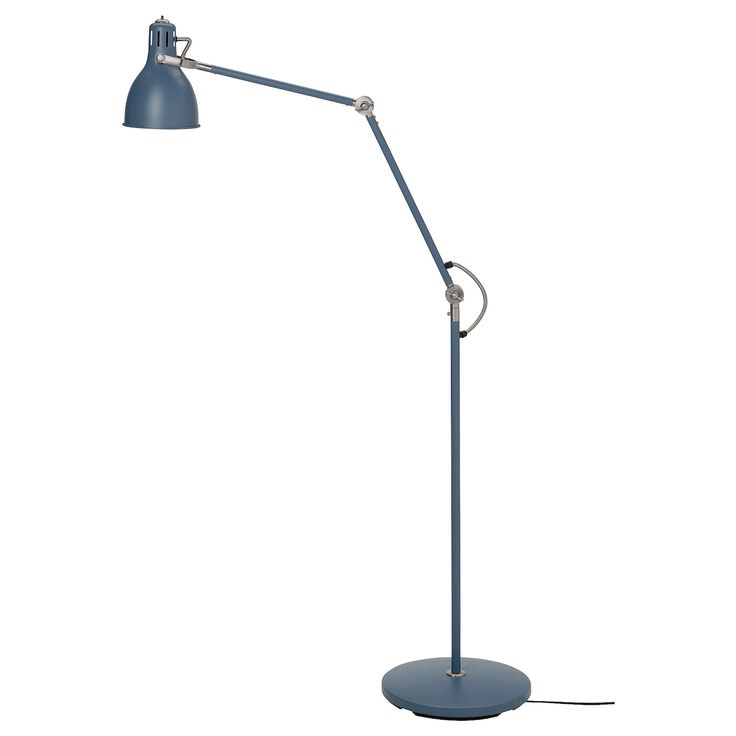 a blue floor lamp on a white background