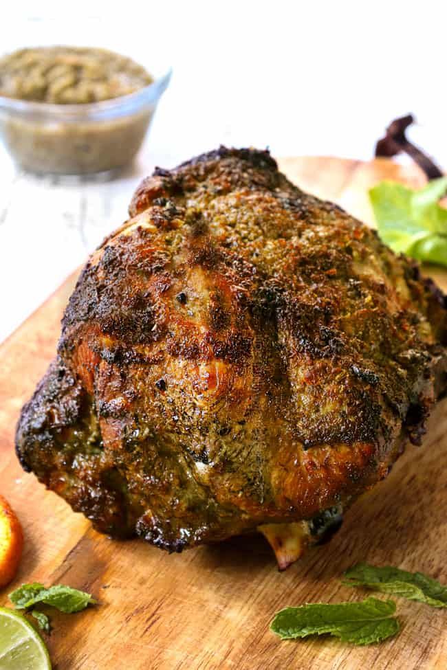 a piece of meat sitting on top of a wooden cutting board