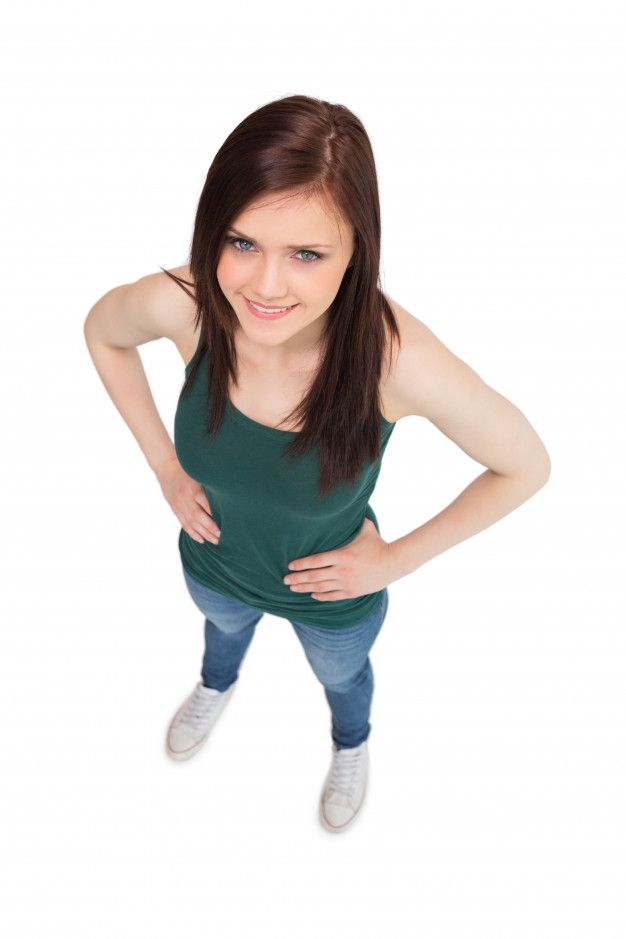 a woman standing with her hands on her hips