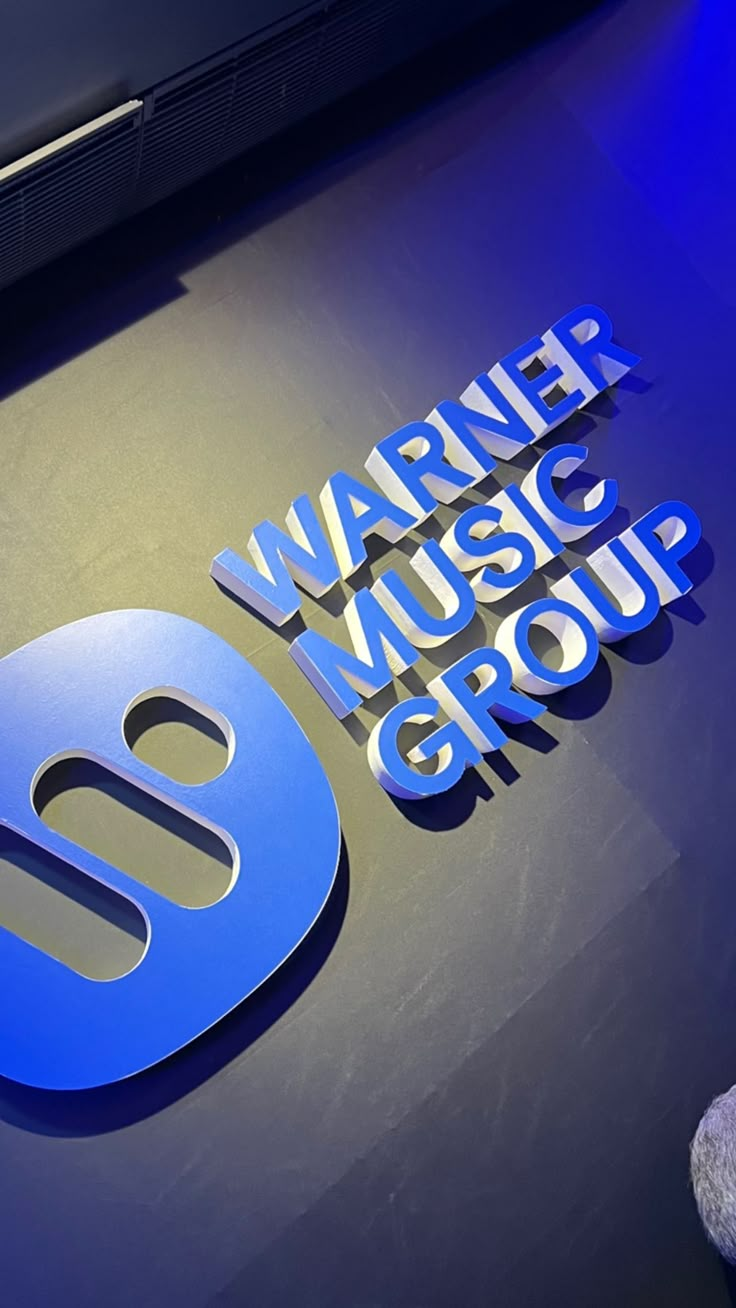 the logo for marine music group on display