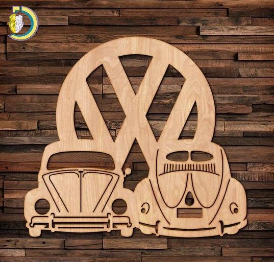 a wooden cutout of two vw buggies