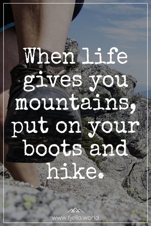 a person walking on rocks with the words when life gives you mountains, put on your boots and hike